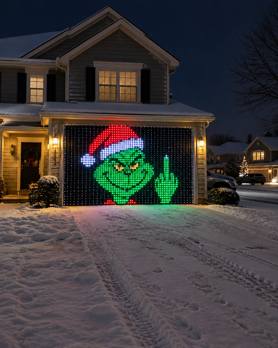 Petty Pixels LED curtain Grinch display on garage at night