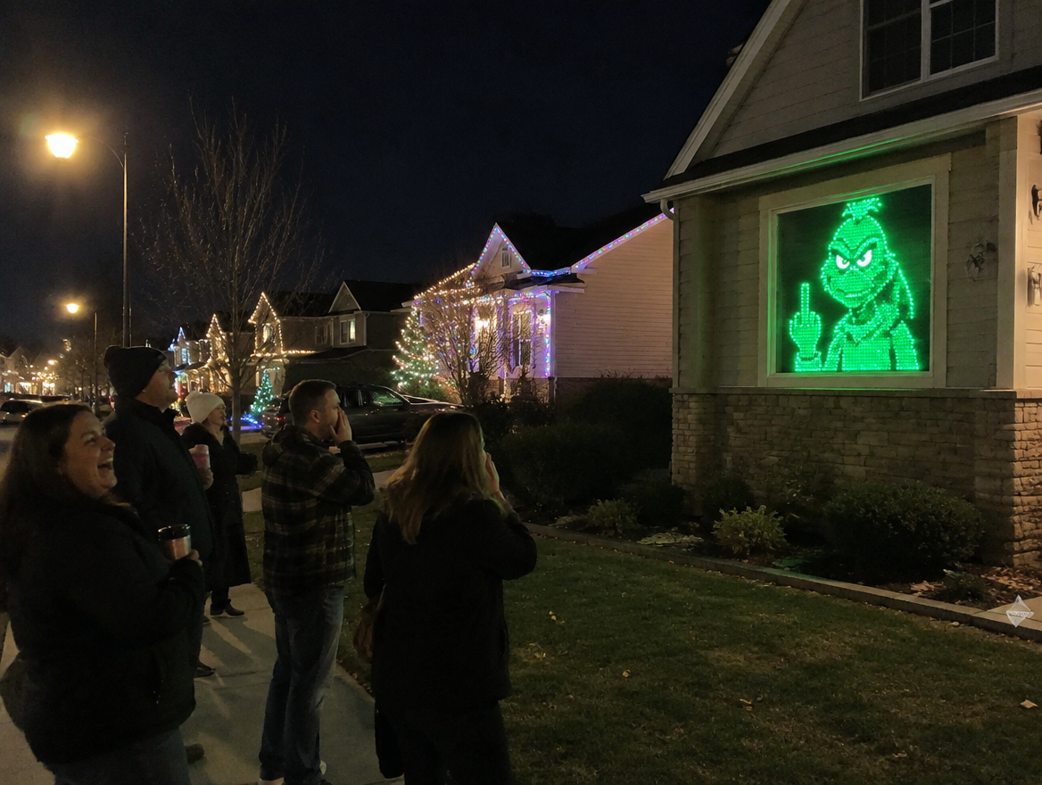 LED pixel curtain lights showing Grinch on window with neighbors watching