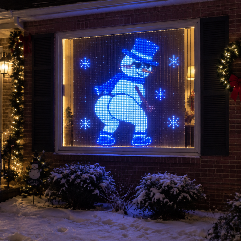 LED pixel curtain lights showing twerking snowman on house window